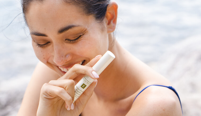 Woman holding the marine peptide lip serum